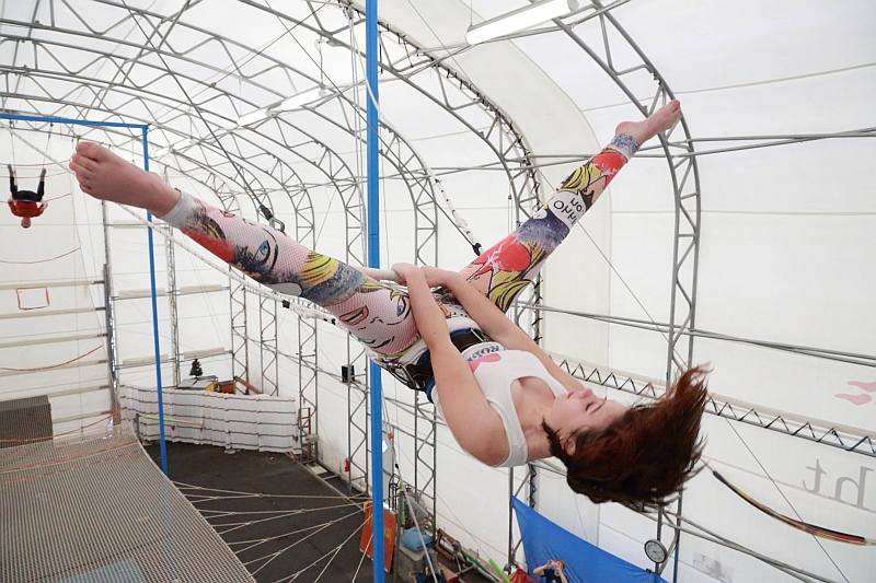Evelyn Randles practices a stradle whip.