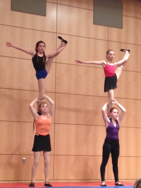 Julaine (bottom left) performing with other members of Cirrus Circus.