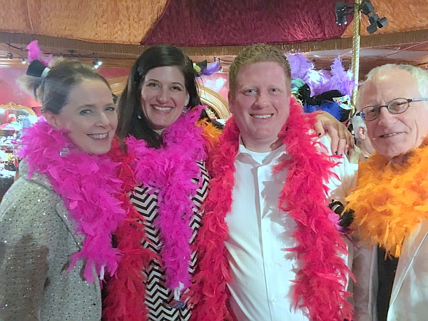 The Harvey Family (right to left) - John, JW, and Michelle, along with Orcas Business Park office manager Shannon Archer, celebrate with SANCA at LEAP with a Twist!